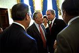 President George W. Bush, Senator Paul Sarbanes, Secretary of Labor Elaine Chao and others