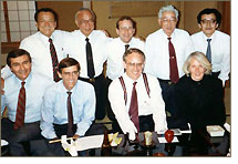 SEC Meeting with the Ministry of Finance of Japan (January 1990): Richard C. Breeden (seated, second from right); John Hartzel, U.S. Treasury (seated, far left); Richard Ketchum (seated, second from left); Michael Mann (standing, center); Linda Quinn (seated, far right)  