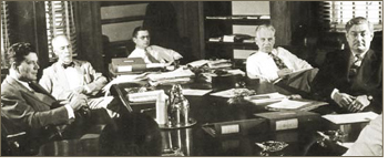 Mid-1940's SEC Commission meeting with staff. 