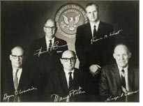 SEC Commission: Hamer Budge (standing, left); Manuel Cohen (seated, center); Hugh F. Owens (seated, right); Francis M. Wheat (standing, right); Byron D. Woodside (seated, left)