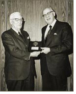 Andrew Barr, (left) and William J. Casey
