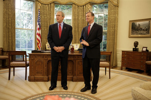 President George W. Bush with Rep. Christopher Cox in the oval office.