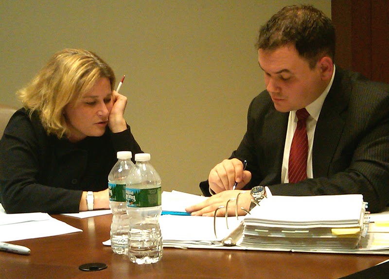 Pace Clinic Director Jill Gross helps student prep for closing arguments of FINRA arbitration hearing