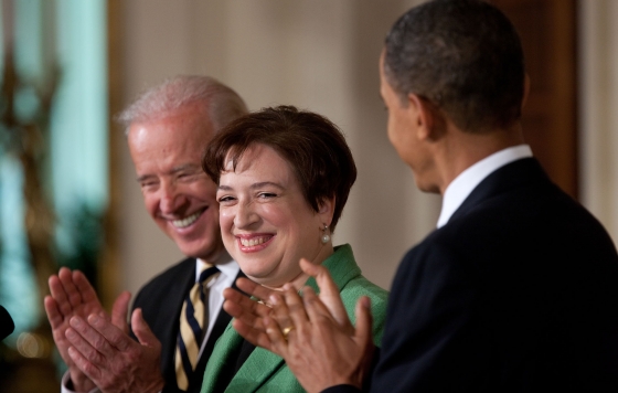 Elena Kagan with President Obama and Vice President Biden, applauding.