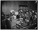 Stanley Reed with the press after his nomination to the U.S. Supreme Court by President Roosevelt was announced