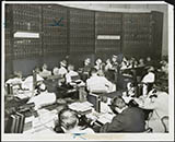 Stockholders checking the Board at 148 Pierrepont Street