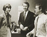 John R. Evans (center) and Lee Spencer (right)