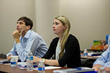 Georgia State University College of Law students James Gallagher and Cassandra Bradford in the Investor Advocacy Clinic seminar course.