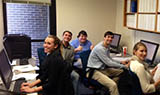 Fall 2013 student interns in the Georgia State Law Investor Advocacy Clinic work room.