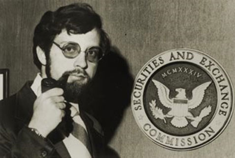 Harvey Pitt, wearing a suit, standing next to an SEC seal, holding a pipe.
